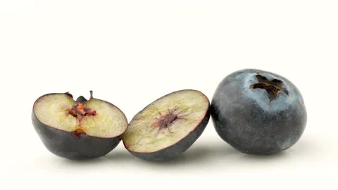 Macro Close-Up of Whole and Cut Half Blueberry Cross-Section 4K Stock Footage 320657891