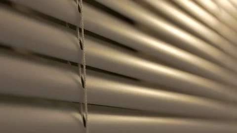 Macro close window shades moving down 스톡 동영상 102162749