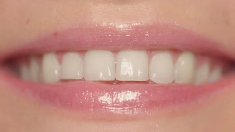 Macro close up woman's lips laughing Stock Footage 113199305