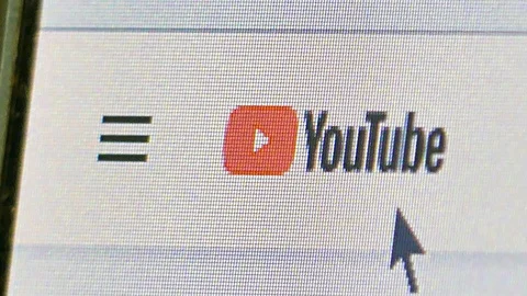 Macro Close Up Youtube Home page Logo with cursor - oblique view Stock Footage 103855802