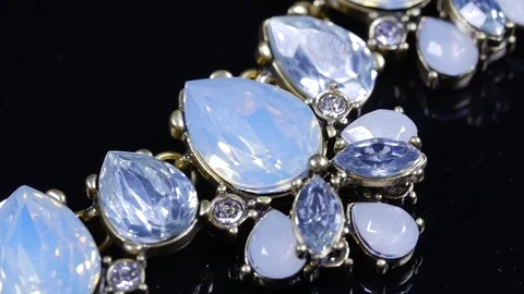 Macro closeup of beautiful necklace rotating around Видео 70245456