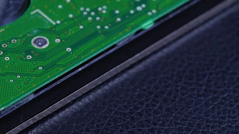 Macro closeup of computer hard drive roating around 2 Video stock 70245469