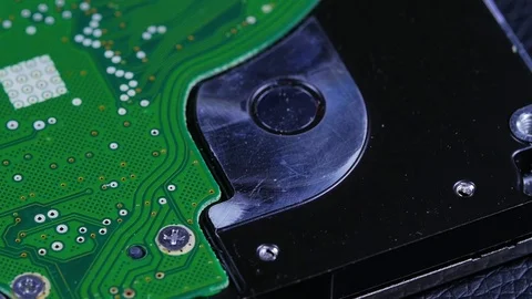 Macro closeup of computer hard drive roating around 3 Video stock 70245871