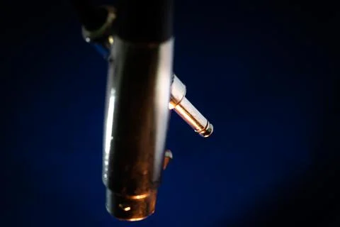 Macro Closeup of Connector Ends of Microphone Cable with XLR end in Front of  Stock Photos