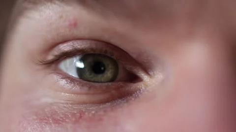 Macro closeup of an eye winking Stock Footage 329586204