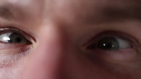 Macro closeup of eyes doing circular eye exercise Stock Footage 329586206