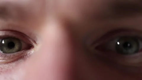 Macro closeup of eyes scanning and analyzing information Stock Footage 329586167