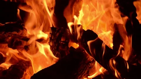 A macro closeup of the flames of a campfire burning in the Sahara desert Stock Footage 49422088