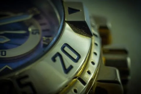 Macro closeup of a golden watch Stock Photos