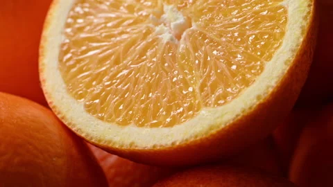 Macro closeup of juicy orange half with fresh citrus pulp Stock Footage 330467832