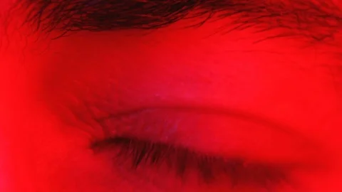 Macro closeup of man rapidly blinking eyes and looking into camera Vidéo 89977868