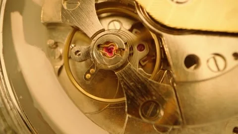 Macro Closeup of Mechanical Watch Movement with Balance Wheel Stock Footage 346240193