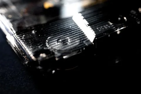 Macro Closeup of Pinch Roller on Bottom Corner of Clear Cassette Tape Laying  Stock Photos