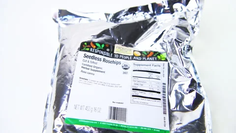 Macro closeup rack focus of dry cut sifted rosehips for herbal tea Stock Footage 194152059