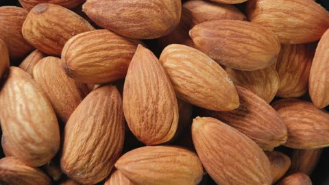 Macro closeup rotates of almonds nut Stock Footage 142678168