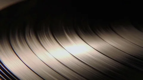 Macro Closeup Shot Of A Vinyl Record Disc Spinning Around Video stock 72306120