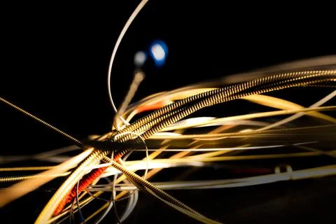 Macro Closeup of Texture on Bunch of Loose Bronze Acoustic Guitar Strings Foto stock