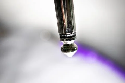 Macro Closeup of Tip on Worn Out Quarter Inch Jack with Opposite End of Cord  Stock Photos