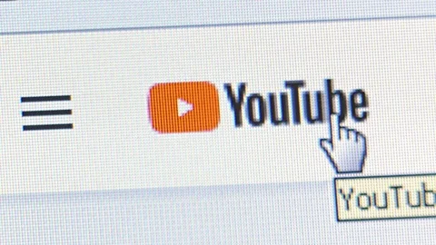 Macro Closeup View of Youtube Logo with User Clicking on It Stock Footage 103855757
