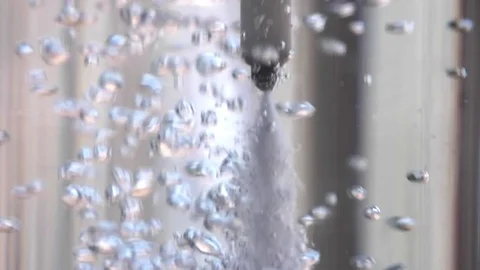 Macro of Co2 Carbonating a Bottle of Water in Slow Motion Macro. Stock Footage 78651544