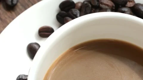 Macro Coffee beans. Top view. roasted coffee beans, 4k vdo . pouring coffee Stock Footage 152842425