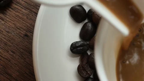 Macro Coffee beans. Top view. roasted coffee beans, 4k vdo . pouring coffee Stock Footage 152842454