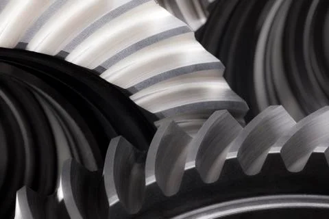 Macro of cog wheels in a machine in grey color Stock Photos