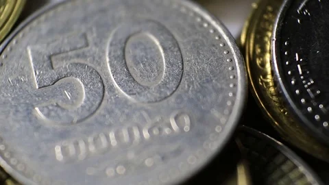 Macro. Coins from different countries Stock Footage 70875254