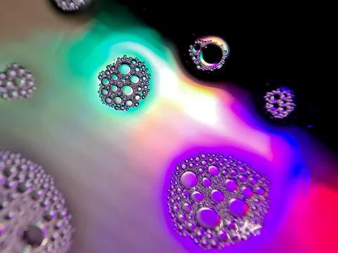 Macro colorful soap bubbles gradient abstract background blue pink Stock Photos