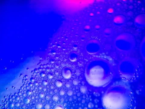 Macro colorful soap bubbles gradient abstract background blue pink Stock Photos