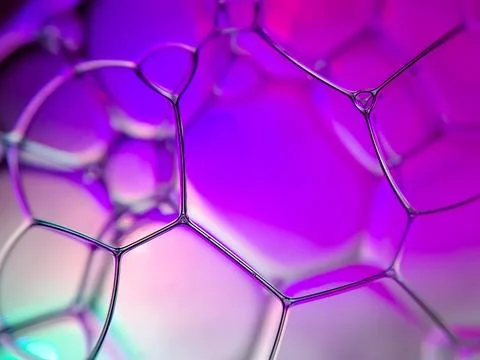 Macro colorful soap bubbles gradient abstract background blue pink Stock Photos