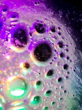 Macro colorful soap bubbles gradient abstract background blue pink Stock Photos