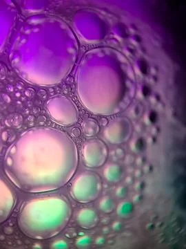 Macro colorful soap bubbles gradient abstract background blue pink Stock Photos