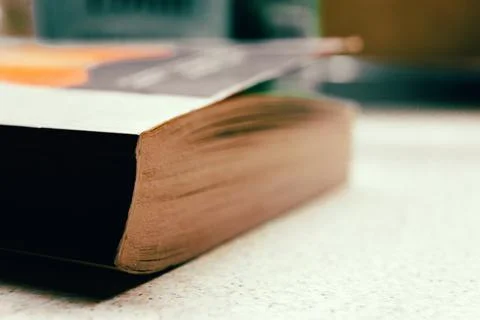 Macro composition of a book on a table Stock-Fotos