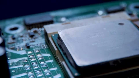 MACRO Computer Motherboard showing chips, transistors and circuits Stock Footage 130208158