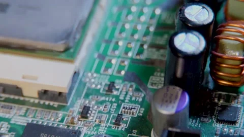 MACRO Computer Motherboard showing chips, transistors and circuits Stock Footage 130208177