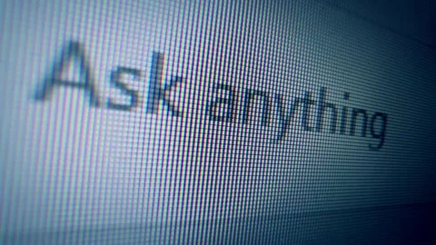 Macro of a computer screen showing a cursor and the text Ask anything. Concept Stock Footage 315989461