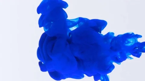Macro concept of blue color paint streaming in water forming abstract shapes  Stock Footage 79780553