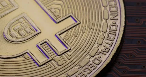 Macro concept of golden Bitcoin. 4K Video Stock Footage 166799383