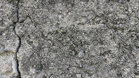 Macro concrete wall with mild textures, subtle cracks, and weathered effect.. Stock Photos