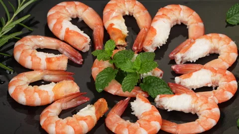 Macro of Cooked Peeled Vietnamese Whiteleg Shrimp Arranged on Plate Stock Footage 339634435