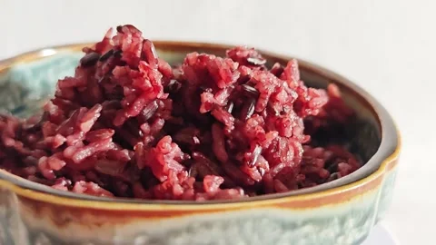 Macro Cooked Thai Riceberry Rice in Ceramic Bowl. Stock Footage 340077194