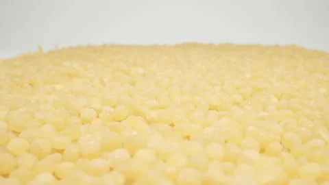 MACRO: Couscous on a white background. Dolly motion Vídeos de archivo 166029603