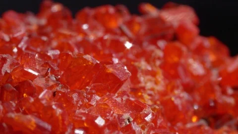 MACRO: Crimson colored precious gemstone Ruby glistening under rays of light. Stock Footage 84592157