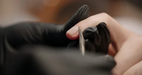 Macro cropped manicure procedure in slow motion at the beauty salon, nail filing Stock Footage 170397662