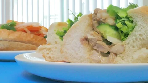 Macro cross section of fresh Vietnamese banh mi sandwich with chicken Stock Footage 340404453