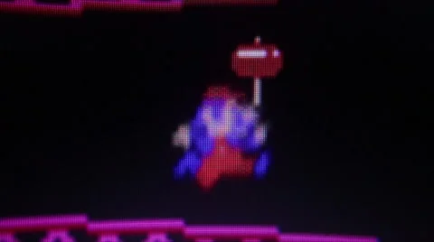 Macro CU 'Mario' the protagonist from 'Donkey Kong' Classic Retro Arcade Vide Stock Footage 55455171