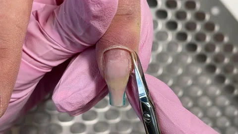 Macro cut of a large cuticle against the background Stock Footage 150458583