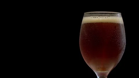 Macro dark beer in a glass Stock Footage 127450195