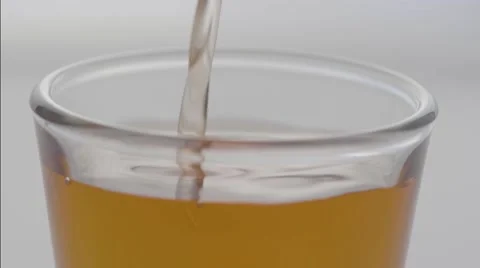 Macro dark rum pour and grab Stock Footage